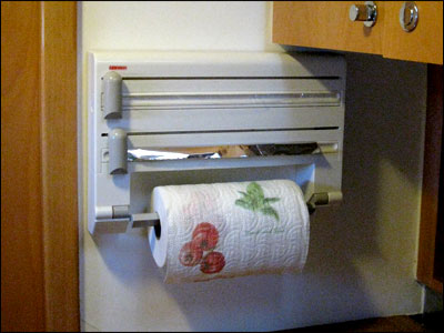 Towel foil and wrap dispenser